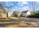 Large backyard with a shed and partially covered patio at 1357 Meadowdale Rd, Rock Hill, SC 29732