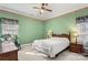 Spacious bedroom with a king-size bed and ceiling fan at 1357 Meadowdale Rd, Rock Hill, SC 29732