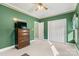 Bedroom with dresser, closet, and ceiling fan at 1357 Meadowdale Rd, Rock Hill, SC 29732