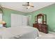 Green bedroom with double doors to closet and bathroom at 1357 Meadowdale Rd, Rock Hill, SC 29732