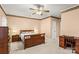 Spacious bedroom with wooden furniture and a ceiling fan at 1357 Meadowdale Rd, Rock Hill, SC 29732