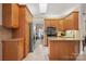 Kitchen with island, stainless steel appliances, and wood cabinets at 1357 Meadowdale Rd, Rock Hill, SC 29732