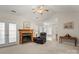 Spacious living room with fireplace, built-in shelving and views into the kitchen and dining areas at 1357 Meadowdale Rd, Rock Hill, SC 29732