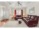 Relaxing living room featuring leather furniture and a ceiling fan at 1357 Meadowdale Rd, Rock Hill, SC 29732