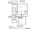 First floor plan showing kitchen, living room, and two-car garage at 13705 Glennmayes Dr, Huntersville, NC 28078