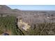 Aerial view of home with mountain backdrop at 247 Camp Rotary Rd, Gastonia, NC 28052