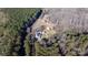 Aerial view showing home surrounded by trees at 247 Camp Rotary Rd, Gastonia, NC 28052