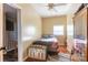 Small bedroom with wood floors and a wooden chest at 247 Camp Rotary Rd, Gastonia, NC 28052