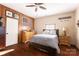 Bright bedroom with wood floors and a rustic dresser at 247 Camp Rotary Rd, Gastonia, NC 28052