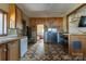 Kitchen with stainless steel fridge and wood cabinets at 247 Camp Rotary Rd, Gastonia, NC 28052