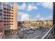 Condo balcony view showing city construction, parking, and building amenities at 300 W 5Th St # 339, Charlotte, NC 28202