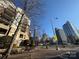 Street view of Fifth & Poplar with nearby cityscape buildings at 300 W 5Th St # 339, Charlotte, NC 28202