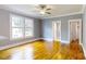 Bright bedroom with hardwood floors and ceiling fan at 315 9Th Sw St, Conover, NC 28613