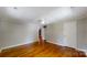 Well-lit bedroom, hardwood floors, and classic doors at 315 9Th Sw St, Conover, NC 28613