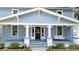 Inviting front porch with white columns and a swing at 315 9Th Sw St, Conover, NC 28613