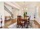 Formal dining room with hardwood floors, chandelier and wainscoting at 4008 Pinot Way, Indian Land, SC 29707