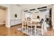 Bright dining area with hardwood floors and view to living room at 4008 Pinot Way, Indian Land, SC 29707