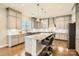 Granite kitchen island with stainless steel appliances at 4008 Pinot Way, Indian Land, SC 29707