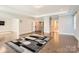 Main bedroom with hardwood floors and access to other rooms at 4008 Pinot Way, Indian Land, SC 29707