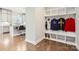 Convenient mudroom with built-in shelving and hooks at 4008 Pinot Way, Indian Land, SC 29707