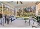 Relaxing screened porch with wooded views and comfortable seating at 4008 Pinot Way, Indian Land, SC 29707