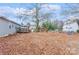 Large backyard with a playset and plenty of space to play at 511 E Church St, Kershaw, SC 29067