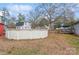 Above-ground pool in backyard with surrounding yard at 511 E Church St, Kershaw, SC 29067