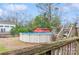 Above ground pool with deck access and shed in background at 511 E Church St, Kershaw, SC 29067