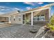 Spacious back patio with paver stones and screened porch at 9023 Daring Ct, Charlotte, NC 28215