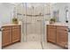 Double vanity bathroom with large walk-in shower at 9023 Daring Ct, Charlotte, NC 28215