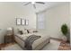 Cozy bedroom with hardwood floors and neutral color scheme at 9023 Daring Ct, Charlotte, NC 28215