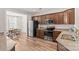 Modern kitchen with stainless steel appliances and granite countertops at 9023 Daring Ct, Charlotte, NC 28215