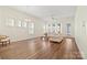 Bright living room featuring hardwood floors and ample natural light at 9023 Daring Ct, Charlotte, NC 28215