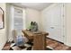 Home office featuring hardwood floors and built-in closet at 9023 Daring Ct, Charlotte, NC 28215