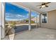 Relaxing screened porch with ceiling fan and view of backyard at 9023 Daring Ct, Charlotte, NC 28215