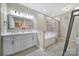 Elegant bathroom with double vanity and soaking tub at 9450 Shumacher Nw Ave, Concord, NC 28027