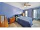 Blue bedroom with double bed and ceiling fan at 9450 Shumacher Nw Ave, Concord, NC 28027