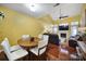 Bright dining area with hardwood floors and a wooden table at 9450 Shumacher Nw Ave, Concord, NC 28027