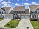 Attractive townhouses with landscaped yards and two-car garages at 9450 Shumacher Nw Ave, Concord, NC 28027