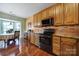 Well-equipped kitchen featuring granite countertops and ample cabinet space at 9450 Shumacher Nw Ave, Concord, NC 28027