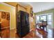 Kitchen boasts black appliances and hardwood floors at 9450 Shumacher Nw Ave, Concord, NC 28027