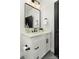 Modern bathroom with white vanity and black accents at 104 Isle Of Pines Rd, Mooresville, NC 28117