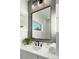 Bathroom features a vanity with modern fixtures and a large mirror at 104 Isle Of Pines Rd, Mooresville, NC 28117