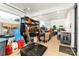 Organized garage with shelving and workbench area at 104 Isle Of Pines Rd, Mooresville, NC 28117