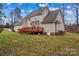 Spacious backyard with a wooden deck, perfect for outdoor entertaining and relaxation at 105 Whimbrel Ln, Mooresville, NC 28117