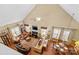 Open concept living room with fireplace, high ceilings and natural light at 105 Whimbrel Ln, Mooresville, NC 28117