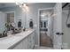 Double vanity bathroom with view of bedroom at 123 Kingfisher Dr, Mooresville, NC 28117