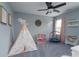 Playful bedroom with teepee, toys, and plenty of natural light at 123 Kingfisher Dr, Mooresville, NC 28117