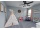 Playful bedroom with teepee, dollhouse, and a mini trampoline at 123 Kingfisher Dr, Mooresville, NC 28117