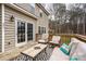 Deck with seating area, adjacent to sliding glass doors at 123 Kingfisher Dr, Mooresville, NC 28117